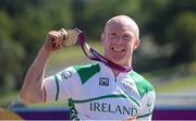 7 September 2012; Ireland's Mark Rohan, from Ballinahown, Co. Westmeath, celebrates with his gold medal after victory in the men's individual H 1 road race. London 2012 Paralympic Games, Cycling, Brands Hatch, Kent, England. Picture credit: Brian Lawless / SPORTSFILE
