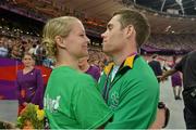 7 September 2012; Ireland's Jason Smyth, from Eglinton, Co. Derry, celebrates with his fiance Elisa Jordan after winning gold in the men's 200m - T13 final. London 2012 Paralympic Games, Athletics, Olympic Stadium, Olympic Park, Stratford, London, England. Picture credit: Brian Lawless / SPORTSFILE
