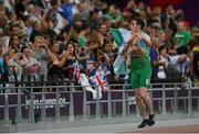 7 September 2012; Ireland's Jason Smyth, from Eglinton, Co. Derry, celebrates after winning gold the men's 200m - T13 final. London 2012 Paralympic Games, Athletics, Olympic Stadium, Olympic Park, Stratford, London, England. Picture credit: Brian Lawless / SPORTSFILE
