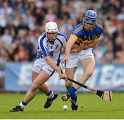 15 July 2012; Stephen Molumphy, Waterford, in action against Pa Bourke, Tipperary. Munster GAA Hurling Senior Championship Final, Waterford v Tipperary, Pairc Ui Chaoimh, Cork. Picture credit: Stephen McCarthy / SPORTSFILE
