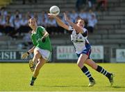 8 September 2012; Caroline Little, Fermanagh, has her kick blocked by Michelle McGrath, Waterford. TG4 All-Ireland Ladies Football Intermediate Championship Semi-Final, Fermanagh v Waterford, St. Brendan’s Park, Birr, Co. Offaly. Picture credit: Barry Cregg / SPORTSFILE