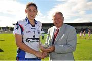 8 September 2012; Michelle Ryan, Waterford, is presented with the player of the match award by Pat Quill, President, Ladies Gaelic Football Association. TG4 All-Ireland Ladies Football Intermediate Championship Semi-Final, Fermanagh v Waterford, St. Brendan’s Park, Birr, Co. Offaly. Picture credit: Barry Cregg / SPORTSFILE