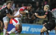 8 September 2012; John Afoa, Ulster, is tackled by Ashley Beck, left, and Richard Fussell, Ospreys. Celtic League, Round 2, Ospreys v Ulster, Liberty Stadium, Swansea, Wales. Picture credit: Steve Pope / SPORTSFILE