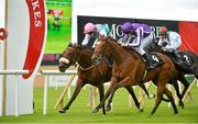 9 September 2012; Up, right, with Joseph O'Brien up, crosses the finish line to win the Irresistible Jewel Blandford Stakes by a short head over Caponata, with Pat Smullen up. Curragh Racecourse, the Curragh, Co. Kildare. Picture credit: Barry Cregg / SPORTSFILE