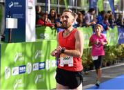 29 October 2017; Rob Pearson crosses the finish line during the SSE Airtricity Dublin Marathon 2017 at Merrion Square in Dublin City. 20,000 runners took to the Fitzwilliam Square start line to participate in the 38th running of the SSE Airtricity Dublin Marathon, making it the fifth largest marathon in Europe. Photo by Sam Barnes/Sportsfile