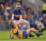 15 July 2012; Bobby Duggan, Clare, in action against Thomas Hamill, Tipperary. Munster GAA Hurling Minor Championship Final, Tipperary v Clare, Pairc Ui Chaoimh, Cork. Picture credit: Stephen McCarthy / SPORTSFILE