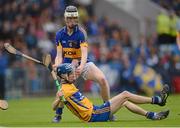 15 July 2012; Bobby Duggan, Clare, in action against Thomas Hamill, Tipperary. Munster GAA Hurling Minor Championship Final, Tipperary v Clare, Pairc Ui Chaoimh, Cork. Picture credit: Stephen McCarthy / SPORTSFILE