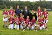 9 September 2012; Representing Galway hurling in the INTO/RESPECT Exhibition GoGames at the GAA Hurling All-Ireland Senior Championship Final between Kilkenny and Galway are, front row, from left, Ben Mc Gahon, Gaelscoil De Hide, Cnoc na Cruibe, Co. Roscommon, Jack Devereux, Piercestown N.S., Drinagh, Co. Wexford, Trevor Healy, Dangan N.S., Summerhill, Co. Meath, Caolan Duffy, Tattygar P.S., Lisbellaw, Co. Fermanagh, Rory Weir, Edendork P.S., Dungannon, Co. Tyrone, Luke Finnerty, Scoil Mhuire, Lucan, Co. Dublin,  and back row, from left, Sean Kelly, St. Canice’s P.S., Dungiven, Co. Derry, Niall Fitzpatrick, Lisboduff N.S., Cootehill, Co. Cavan, Eugene Fitzgibbon, coach, Uachtarán Chumann Lúthchleas Gael Liam Ó Néill, Anne Fay, INTO President, Shane Kiely, Scoil Mhuire N.S., Abbeyside, Dungarvan, Co. Waterford, Oscar Bent, St. Olaf’s N.S., Dundrum, Co. Dublin. Croke Park, Dublin. Picture credit: Pat Murphy / SPORTSFILE
