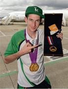 10 September 2012; Team Ireland's Michael McKillop, from Newtownabbey, Co. Antrim, gold medal, 1500m -T37 and 800m -T37, pictured with his two gold medals and Whang Youn Dai Achievement award prior to departure for Dublin. London 2012 Paralympic Games, Team Ireland Athletes Prepare for Departure, London City Airport, London, England. Picture credit: Brian Lawless / SPORTSFILE