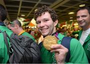 10 September 2012; Darragh McDonald, from Gorey, Co. Wexford, gold medal, men's 400m freestlye - S6, pictured on his arrival home from the London 2012 Paralympic Games. Dublin Airport, Dublin. Picture credit: Brian Lawless / SPORTSFILE