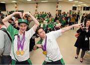 10 September 2012; Team Ireland's Michael McKillop, from Newtownabbey, Co. Antrim, gold medal, 1500m -T37 and 800m -T37, left, and Jason Smyth, from Eglinton, Co. Derry, gold medal, men's 200m -T13 and men's 100m -T13, pictured on their arrival home from the London 2012 Paralympic Games. Dublin Airport, Dublin. Picture credit: Brian Lawless / SPORTSFILE