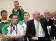 10 September 2012; Team Ireland's Jason Smyth, from Eglinton, Co. Derry, gold medal, men's 200m -T13 and men's 100m -T13, with Minister of State for Tourism & Sport Michael Ring T.D. on his arrival home from the London 2012 Paralympic Games. Dublin Airport, Dublin. Picture credit: Brian Lawless / SPORTSFILE