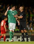11 September 2012; Kyle Lafferty, Northern Ireland, disputes a decision with referee Vlado Glodjovic. 2014 FIFA World Cup Qualifier Group F, Northern Ireland v Luxembourg, Windsor Park, Belfast, Co. Antrim. Picture credit: Oliver McVeigh / SPORTSFILE