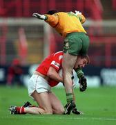 5 April 1998; Alan O'Regan of Cork in action against Damian Diver of Donegal during the Church & General National Football League quarter-final match between Cork and Donegal at Croke Park in Dublin. Photo by Ray McManus/Sportsfile