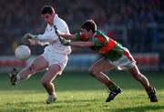 29 November 1998; Anthony Rainbow of Kildare is tackled by Aidan Higgins of Mayo during the Church & General National Football League match between Kildare and Mayo at St Conleth's Park in Newbridge, Kildare. Photo by Brendan Moran/Sportsfile