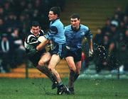 13 December 1998; Brendan Lynch of Doonbeg in action against John McGrath of Moyle Rovers during the AIB Munster Senior Club Football Championship Final between Doonbeg and Moyle Rovers at the Gaelic Grounds in Limerick. Photo by Brendan Moran/Sportsfile