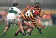 13 December 1998; Brendan O'Leary of Rathnure in action against Brian Murphy, left, and Des Kileen of Portlaoise during the AIB Leinster Club Hurling Championship Final match between Rathnure and Portlaoise at Nowlan Park in Kilkenny. Photo by Ray McManus/Sportsfile