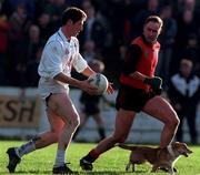 14 December 1997; Brian Murphy of Kildare in action against Conor Deegan of Down during the Church & General National Football League match between Down and Kildare at Pairc Esler in Newry, Down. Photo by David Maher/Sportsfile