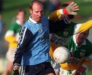 29 November 1998; Brian Stynes of Dublin in action against John Kenny of Offaly during the Church & General National Football League Division 1a match between Offaly and Dublin at O'Connor Park in Tullamore, Offaly. Photo by Matt Browne/Sportsfile