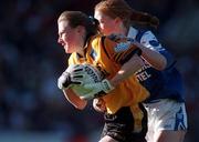 25 October 1998; Cathriona Brady of Monaghan in action against Geraldine O'Ryan of Waterford during the All-Ireland Senior Ladies' Football Championship Final Replay match between Waterford and Monaghan at Croke Park in Dublin. Photo by Brendan Moran/Sportsfile