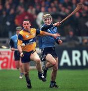 29 March 1998; Colin Lynch of Clare in action against Stephen Perkins of Dublin during the Church & General National Hurling League match between Dublin and Clare at Parnell Park in Dublin. Photo by Ray McManus/Sportsfile