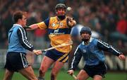 29 March 1998; Conor Clancy of Clare in action against Derek McMullen of Dublin during the Church & General National Hurling League match between Dublin and Clare in Parnell Park in Dublin. Photo by Ray McManus/Sportsfile