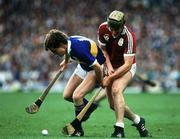 4 September 1988; Nicky English of Tipperary in action against Conor Hayes of Galway during the All-Ireland Senior Hurling Championship Final match between Galway and Tipperary at Croke Park in Dublin. Photo by Ray McManus/Sportsfile