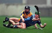 29 March 1998; Conor McCann of Dublin is tackled by Frank Lohan of Clare during the Church & General National Hurling League match between Dublin and Clare at Parnell Park in Dublin. Photo by Ray McManus/Sportsfile