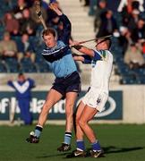 14 November 1998; Damian McMullan of Dublin in action against Dan Shanahan of Waterford during the Oireachtas Cup match between Dublin and Waterford at Parnell Park in Dublin. Photo by Damien Eagers/Sportsfile