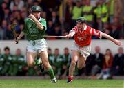 26 May 1996; Damien Quigley of Limerick in action against Timmy Kelleher of Cork during the Guinness Munster Senior Hurling Championship Quarter-Final match between Cork and Limerick at Pairc Ui Chaoimh in Cork. Photo by Ray McManus/Sportsfile
