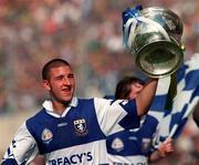 15 September 1996; Danny Doogue of Laois celebrates with the trophy following the GAA Football All-Ireland Minor Championship Final match between Kerry and Laois at Croke Park in Dublin. Photo by David Maher/Sportsfile