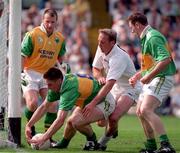 30 August 1998; Darragh O Se of Kerry picks up the ball under pressure from Willie McCreery of Kildare during the All-Ireland Senior Football Championship Semi-Final match between Kildare and Kerry at Croke Park in Dublin.Photo by Brendan Moran/Sportsfile