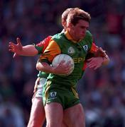 15 September 1996; Darren Fay of Meath holds possession under pressure from Ray Dempsey of Mayo during the Bank of Ireland All-Ireland Senior Football Championship Final between Meath and Mayo at Croke Park in Dublin. Photo by Ray McManus/Sportsfile