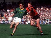 15 September 1991; David Beggy of Meath in action against Barry Breen of Down during the All-Ireland Senior Football Championship Final between Down and Meath at Croke Park in Dublin. Photo by David Maher/Sportsfile