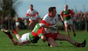 5 April 1998; Dermot Dougan of Derry in action against David Heaney of Mayo during the Church & General National Football League quarter-final match between Derry and Mayo at Pairc Markievicz in Sligo. Photo by Damien Eagers/Sportsfile