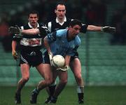 13 December 1998; Derry Foley of Moyle Rovers in action against Francis McInerney of Doonbeg during the AIB Munster Senior Club Football Championship Final between Doonbeg and Moyle Rovers at the Gaelic Grounds in Limerick. Photo by Brendan Moran/Sportsfile