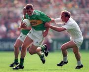 30 August 1998; Donal Daly of Kerry in action against Willie McCreery of Kildare during the All-Ireland Senior Football Championship Semi-Final match between Kildare and Kerry at Croke Park in Dublin. Photo by Ray McManus/Sportsfile