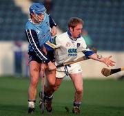 14 November 1998; Stephen Perkins of Dublin in action against T. Flynn of Waterford during the Oireachtas Cup match between Dublin and Waterford at Parnell Park in Dublin. Photo by Damien Eagers/Sportsfile