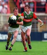 11 August 1996; Eamonn Breen of Kerry in action against Pat Fallon of Mayo during the GAA All-Ireland Senior Football Championship Semi-Final match between Mayo and Kerry at Croke Park in Dublin. Photo by Ray McManus/Sportsfile