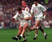 27 September 1998; Eddie McCormack of Kildare in action against Sean Og De Paor of Galway during the All-Ireland Senior Football Final match between Galway and Kildare at Croke Park in Dublin. Photo by Brendan Moran/Sportsfile