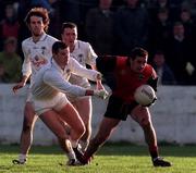 14 December 1997; Finbar Caulfield of Down in action against Pauric Brennan of Kildare during the Church & General National Football League match between Down and Kildare at Pairc Esler in Newry, Down. Photo by David Maher/Sportsfile