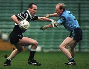 13 December 1998; Francis McInerney of Doonbeg in action against Liam Cronin of Moyle Rovers during the AIB Munster Senior Club Football Championship Final between Doonbeg and Moyle Rovers at the Gaelic Grounds in Limerick. Photo by Brendan Moran/Sportsfile