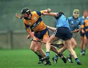 29 March 1998; Frank Lohan of Clare in action against Barry O'Sullivan of Dublin during the Church & General National Hurling League match between Dublin and Clare in Parnell Park in Dublin. Photo by Ray McManus/Sportsfile