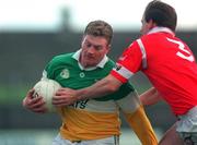 1 November 1998; Frank Weir of Offaly in action against Ronan McCarthy of Cork during the Church & General National Football League match between Offaly and Cork at O'Connor Park in Tullamore, Offaly. Photo by David Maher/Sportsfile