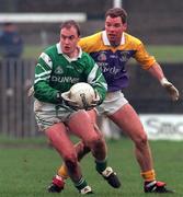 22 November 1998; Tom Bowe of Stradbally in action against John O'Callaghan of Kilmacud Crokes during the AIB Leinster Club Football Semi-Final match between Kilmacud and Stradbally at O'Connor Park in Tullamore, Offaly. Photo by David Maher/Sportsfile