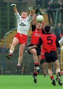 18 May 1997; Greg McCartan, supported by Down team-mate Daniel Flynn, 5, competes for possession with Jody Gormley of Tyrone during the Bank of Ireland Ulster Senior Football Championship preliminary round at St. Tiernach's Park in Clones, Monaghan. Photo by David Maher/Sportsfile