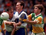 15 June 1998; Brian Whelan, left, and Hugh Kenny of Wicklow in action against Colm Quinn of Offaly during the Bank of Ireland Leinster Senior Football Championship quarter-final match between Offaly and Wicklow at Croke Park in Dublin. Photo by David Maher/Sportsfile
