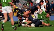 18 October 1998; Darren Fay of Ireland in action against Scott Camporeale and Anthony Stevens of Australia during the International Rules match between Ireland and Australia at Croke Park in Dublin. Photo by Damien Eagers/Sportsfile