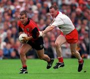 28 July 1996; James McCartan of Down gets away from Chris Lawn of Tyrone during the Bank of Ireland Ulster Senior Football Championship Final between Tyrone and Down at St. Tiernach's Park in Clones, Monaghan. Photo by David Maher/Sportsfile