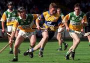 23 August 1998; Jamesie O'Connor of Clare in action against Hubert Rigney, left, and Johnny Pilkington of Offaly during the Guinness All-Ireland Senior Hurling Championship semi-final replay match between Offaly and Clare at Croke Park in Dublin. Photo by Damien Eagers/Sportsfile